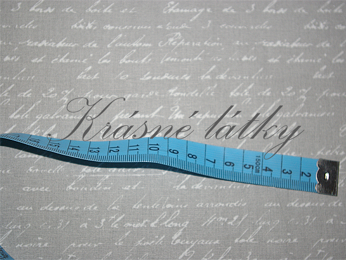 Bavlněná látka písmo na šedém pozadí